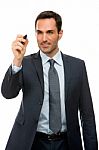 Businessman With A Black Marker Writing Stock Photo
