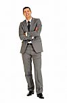 Businessman With Arms Crossed Stock Photo