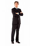 Businessman With Arms Crossed Stock Photo