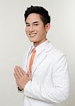 Businessman With Greeting Gesture Stock Photo