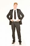 Businessman With Hands On Hips Stock Photo