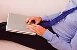 Businessman With Laptop Sitting Couch Stock Photo