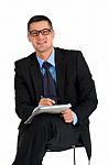 Businessman With Notebook Stock Photo