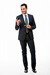 Businessman With Phone And Credit Card Stock Photo