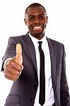 Businessman With Thumb Up Stock Photo