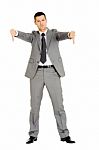 Businessman With Thumbs Down Stock Photo