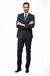 Businessman With With One's Arms Folded Stock Photo