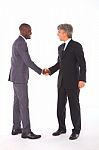 Businessmen Shaking Hands Stock Photo