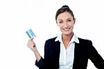 Businesswoman Displaying Her Cash Card Stock Photo