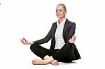 Businesswoman Doing Yoga Stock Photo