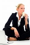 Businesswoman Eating Stock Photo