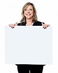 Businesswoman Holding Billboard Stock Photo