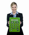 Businesswoman Showing Calculator Stock Photo