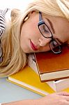 Businesswoman Sleeping On Books Stock Photo