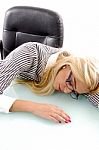 Businesswoman Sleeping On Desk Stock Photo