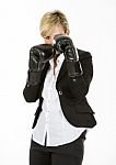 Businesswoman With Boxing Gloves Stock Photo