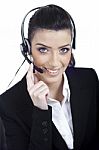 Call Center Woman Dealing With The Customer Wearing Headset Stock Photo
