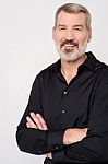 Casual Man Looking At Camera Stock Photo