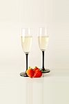 Champagne Flutes With Strawberries Stock Photo