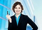Charming Business Lady Holding Credit Card Stock Photo