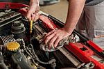 Checking For Engine Oil On A Car Stock Photo