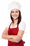 Cheerful Confident Young Female Chef Stock Photo