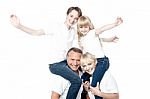 Cheerful Family Over White Background Stock Photo
