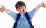 Cheerful School Boy Showing His Thumbs Up Stock Photo