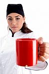 Chef Showing Coffee Mug Stock Photo