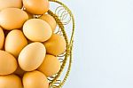 Chicken Eggs In Basket Stock Photo