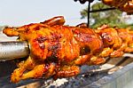 Chicken Roasted On The Spit Stock Photo