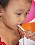 Child Is Drinking Stock Photo