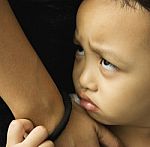 Child With A Sad Face Stock Photo