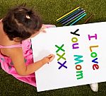 Child With I Love You Mum Message Stock Photo