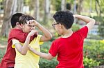 Children Getting Bullied On Outdoor Stock Photo