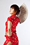 Chinese Model In Traditional Cheongsam Dress Stock Photo