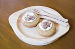 Chocolate And Marshmallow Cookie On Wooden Plate Stock Photo