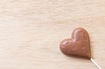Chocolate Hearts Candies On Wooden Background Stock Photo