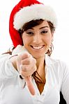Christmas Girl Showing Thumbs Down Stock Photo