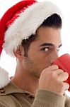 Christmas Guy Drinking Coffee Stock Photo