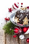 Christmas Pudding With Gingerbreads Stock Photo