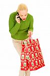 Christmas Shopper On Mobile Phone Stock Photo