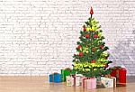 Christmas Tree In White Room Stock Photo