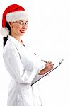 Chrsitmas Doctor With Clipboard Stock Photo