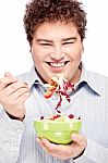 Chubby Man And Salad Stock Photo