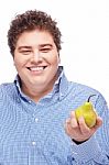 Chubby Man Holding Pear Stock Photo
