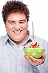 Chubby Man With Fresh Salad Stock Photo