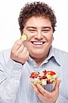 Chubby Man With Fresh Salad Stock Photo