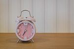 Classic Pink Alarm Clock Stock Photo