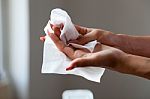 Cleaning Fingers With Wet Wipes Stock Photo
